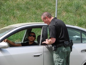 During a SkillsUSA Georgia event, Chattahoochee Technical College student Michael Wells performs a traffic stop on Cobb County Police Explorer Oscar Escarcega, of Marietta.