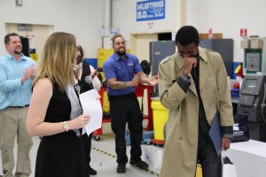 AutoNation Market Human Resources Manager Kristen Sowemimo announces Automotive Technology student Emmanuel Unachukwu as the Student of the Year.