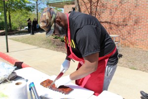 Antoine Guerrier, pictured, and his teammate Frank Brown earned a first-place finish in the Trash Can BBQ Competition.