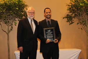 CTC President Dr. Ron Newcomb presents Jourdan Ortiz with the GOAL award.