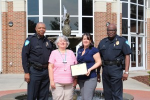 Pictured, from left, are CTC Police Chief Charles Spann, Financial Aid Specialist Barbara Lyle, Financial Administrator Eilla Torres, and Deputy Chief Al Campbell.