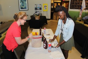 Chattahoochee Technical College welcomed back its students at the North Metro Campus with an ice cream social. Pictured is CTC Instructor Amy Ward dishing up some ice cream for Kennesaw resident and student Lyrics Dundy.