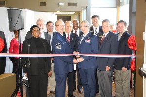 Pictured cutting the ribbon with CTC Communication and Veteran Services Coordinator Dr. Barry Munday is Col. Patricia Ross, USAF (ret.). Joining are Chattahoochee Tech President Dr. Ron Newcomb, second row, far left, and members of Chattahoochee Technical College’s Board of Directors and the Chattahoochee Tech Foundation’s Board of Trustees.