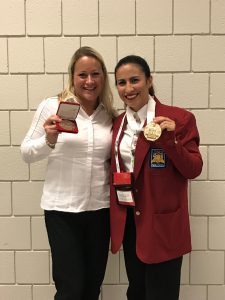 Photo of instructor Jennifer Combs and student Angibel Tome-Martinez.