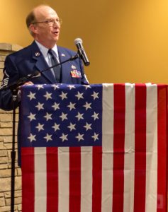 Barry Munday speaks at event for veterans.