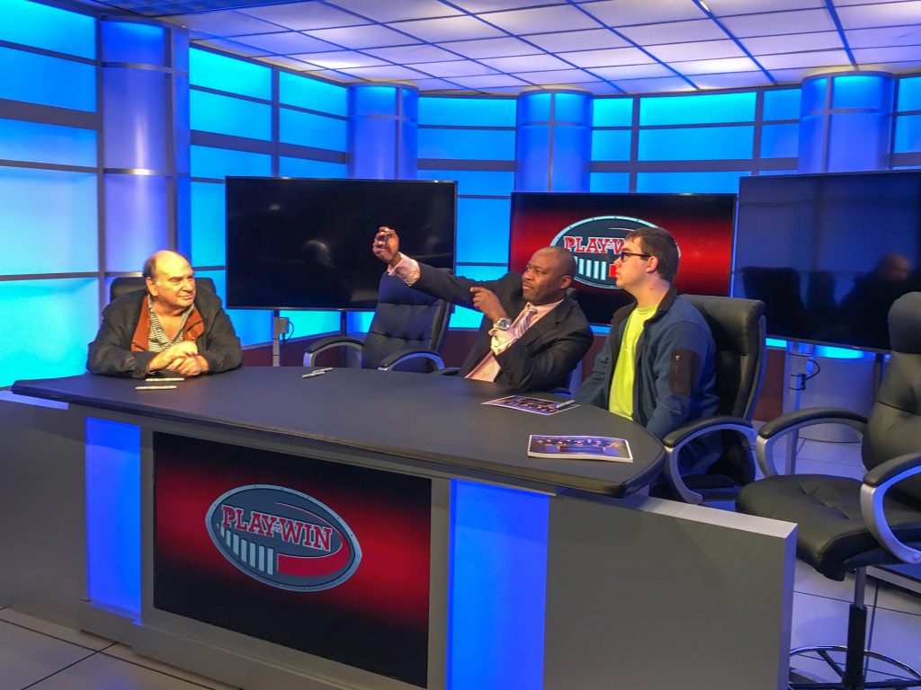 Kell High School senior Logan Tyler met with Play to Win television program cast members Jeffrey Schecter and Dr. Saddiz El-Amin at the Mountain View Open House. Shown here, l-r, are Schechter, El-Amin and Tyler.