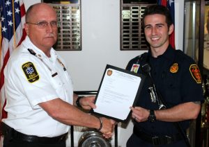Cherokee County Fire Chief presents award.