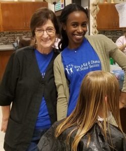 Colette Arp and Chattahoochee Tech student Ashley Greer volunteered at the 2019 Give a Kid a Chance back-to-school event in Bartow County.