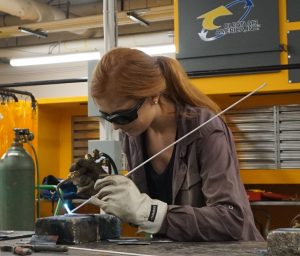 Highley-Sowers demonstrates welding.