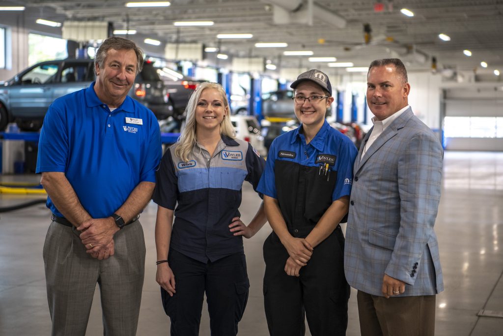 Shown here, l-r, are Ed Voyles Honda General Manager Pete Richards, Sweeton, Cote, and Ed Voyles CDJR General Manager Drew Tutton.