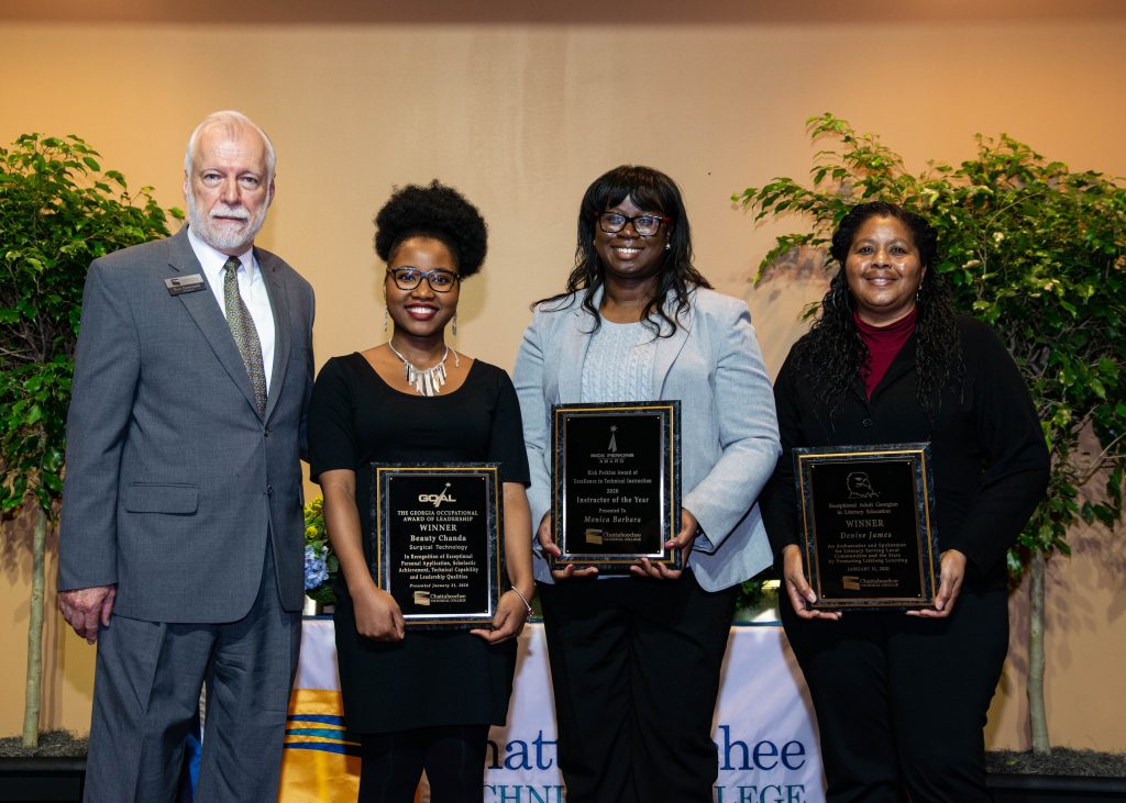 Chattahoochee Tech announced the college’s 2020 GOAL, Rick Perkins Award and EAGLE winners at an awards event Friday, Jan. 31. Shown here, l-r, are Chattahoochee Tech President Dr. Ron Newcomb, GOAL winner Beauty Chanda, Rick Perkins Award winner Monica Barbara, and EAGLE winner Denise James.