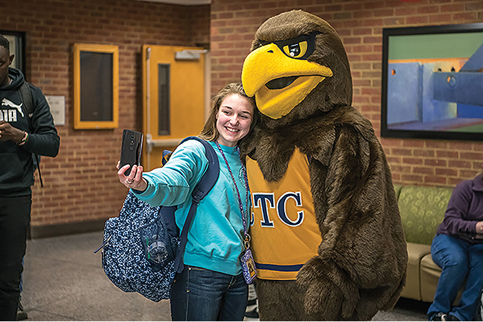 Female student taking selfie with Swoop