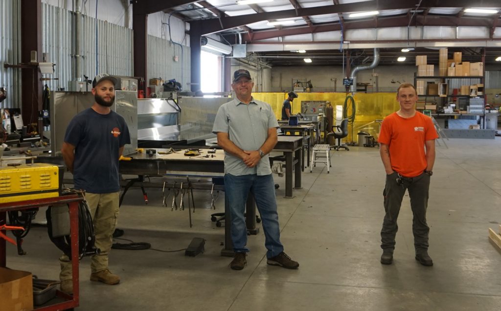 Shown here are William Jesse Cox, Randy Lane, and Wes Lindsay at Lane Mechanical Inc. in Paulding County.