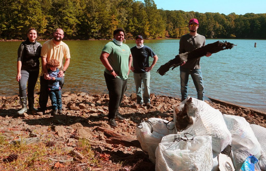 CTC volunteers at the Great Lake Allatoona Clean Up included, l-r, student Tais Pereira-Aquino, along with her husband and son, and student Jessmaine Starks, Chattahoochee Tech instructor Stephen Anderson, and student Jacques Gody.