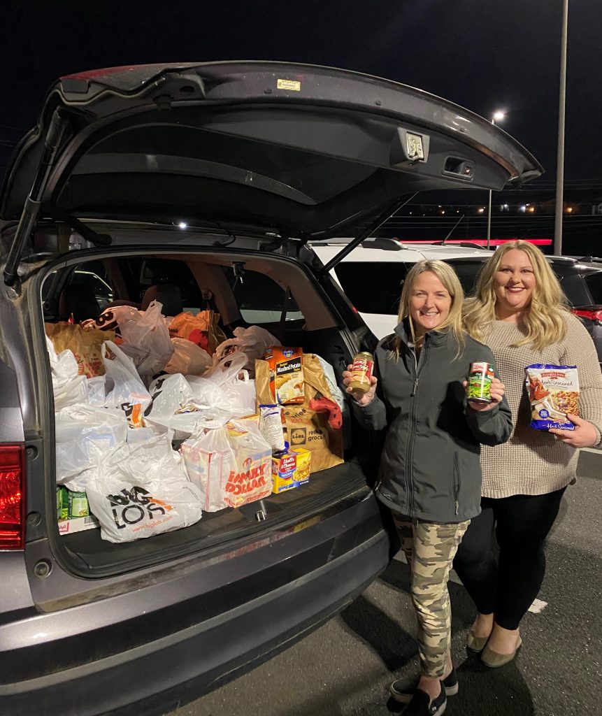 The North Cobb Civitans Club collects food for donation to Golden Eagle Food Pantry.