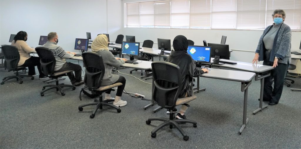 CTC Adult Education Director Chris Hord is shown here with students at the new High School Equivalency testing lab at the Paulding Campus.