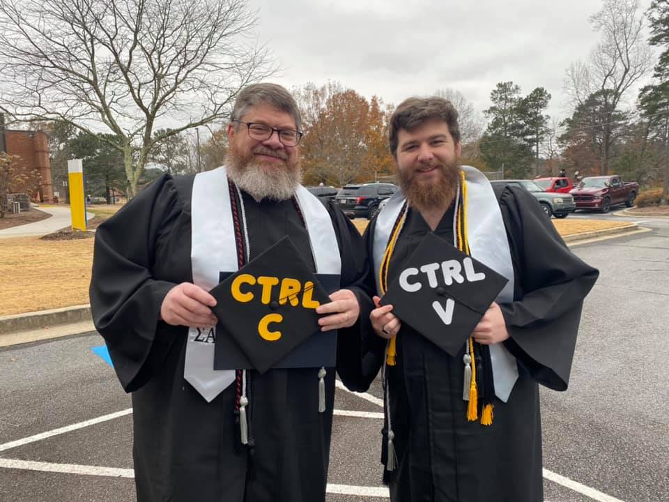 Shown l-r are father and son graduates, Emory Morris and Ethan Morris.