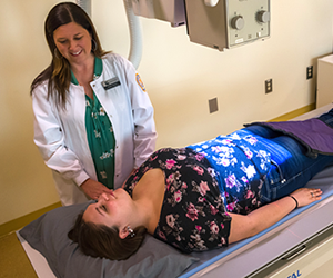 A woman performing medical assistance 