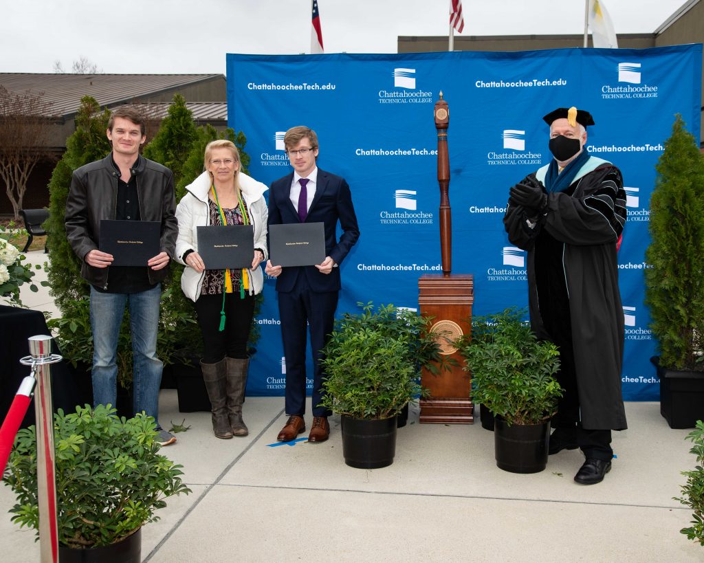 Shown here, l-r, are Garrett, Barbara, and Patrick McCarthy, along with Chattahoochee Tech President Dr. Ron Newcomb.