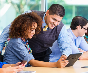 An instructor helping a student