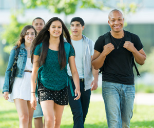 Five students walking