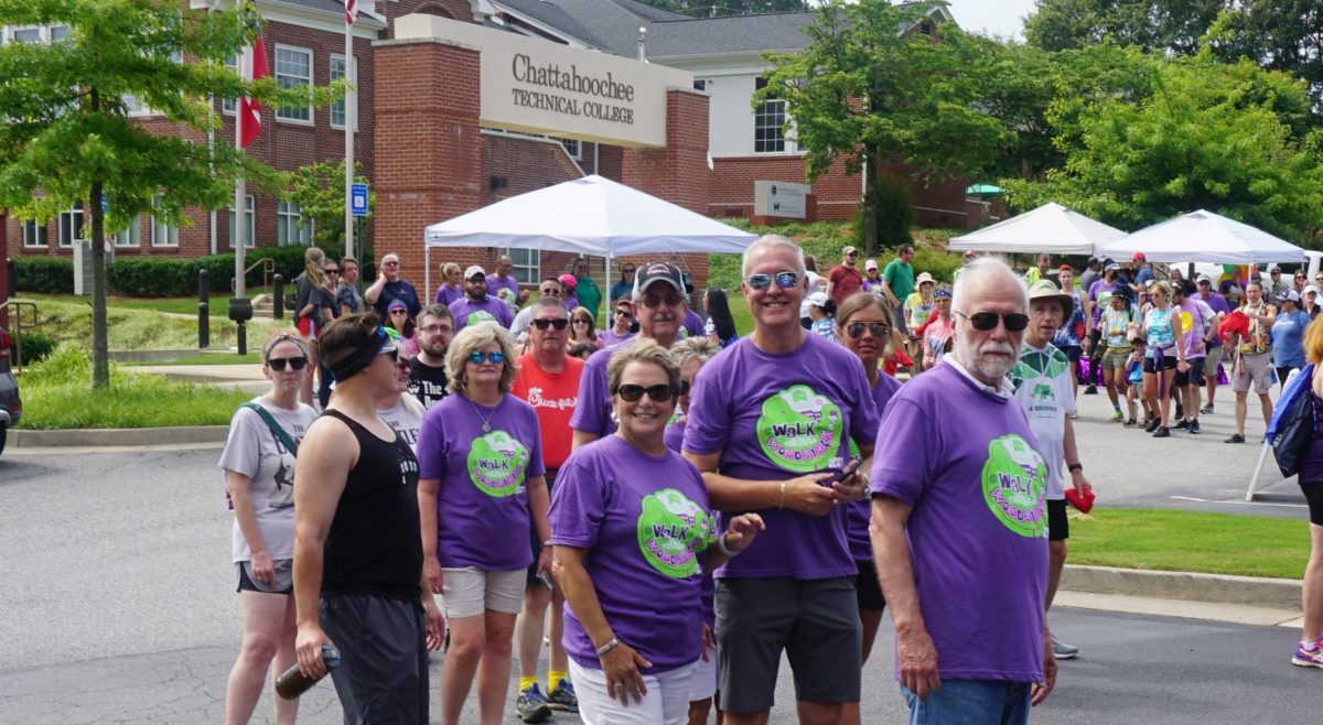 Crowd behind leadership members during Woodstock walk through event