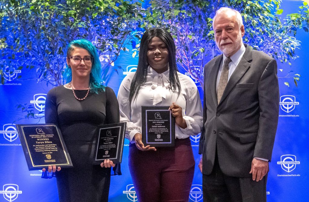 Shown here, l-r, is the 2022 EAGLE winner Taryn Sikes with EAGLE finalist Lailah Anderson and Chattahoochee Tech President Dr. Ron Newcomb.
