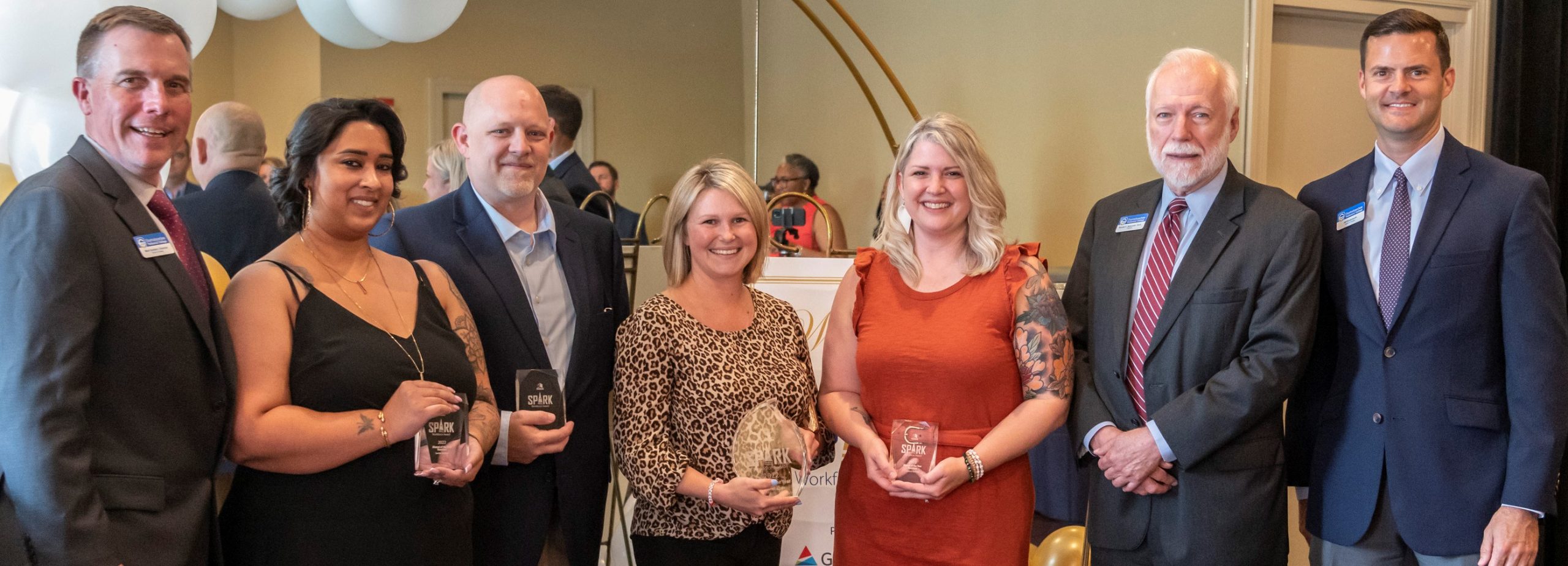 Jennifer Chin received the 2022 Spark Workforce Alumni of the Year Award at Chattahoochee Tech. Shown here, l-r, is Board of Trustees Chair Mark Goddard; Chattahoochee Tech alumni Savita Saldivar, Steven Lavin, Jennifer Chin, and Mary Stapleton; Chattahoochee Tech President Dr. Ron Newcomb; and Board of Trustees member Jeff Butterworth.