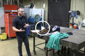 Welding instructor Callahan Roberson showing lab tools