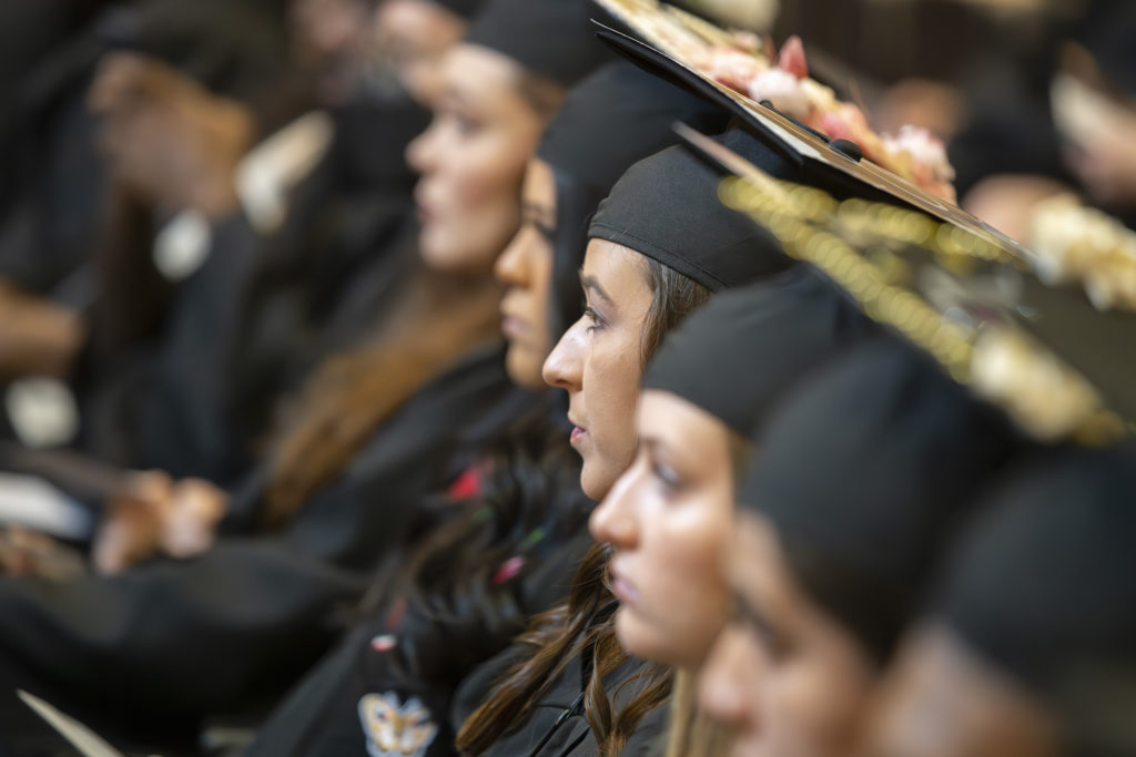 Chattahoochee Tech graduates at commencement listen to featured speakers.