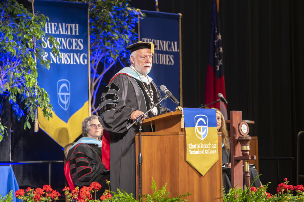 Chattahoochee Tech President Dr. Ron Newcomb is shown here congratulating the graduates.
