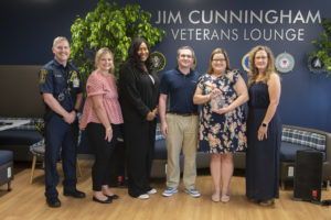 Beau Witcher, Ashley Payne Stoner, Ojay Jones, Samuel Harris, award winner Mattie Harris, and LeighAnn Echols Brock standing and smiling