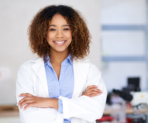 Smiling female doctor wearing a lab coat