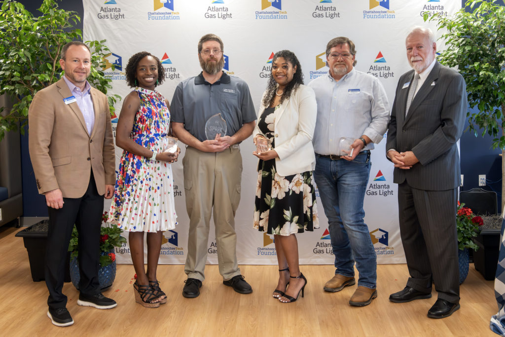 SPARK Workforce Alumni of the Year award winner Paul Hardie is shown in the center here with the finalists, l-r, Dan’elle Buchmueller, Marriah Harris, and Johnathan Tucker, along Board of Trustees Chair Rick Kollhoff, and Chattahoochee Tech President Dr. Ron Newcomb.