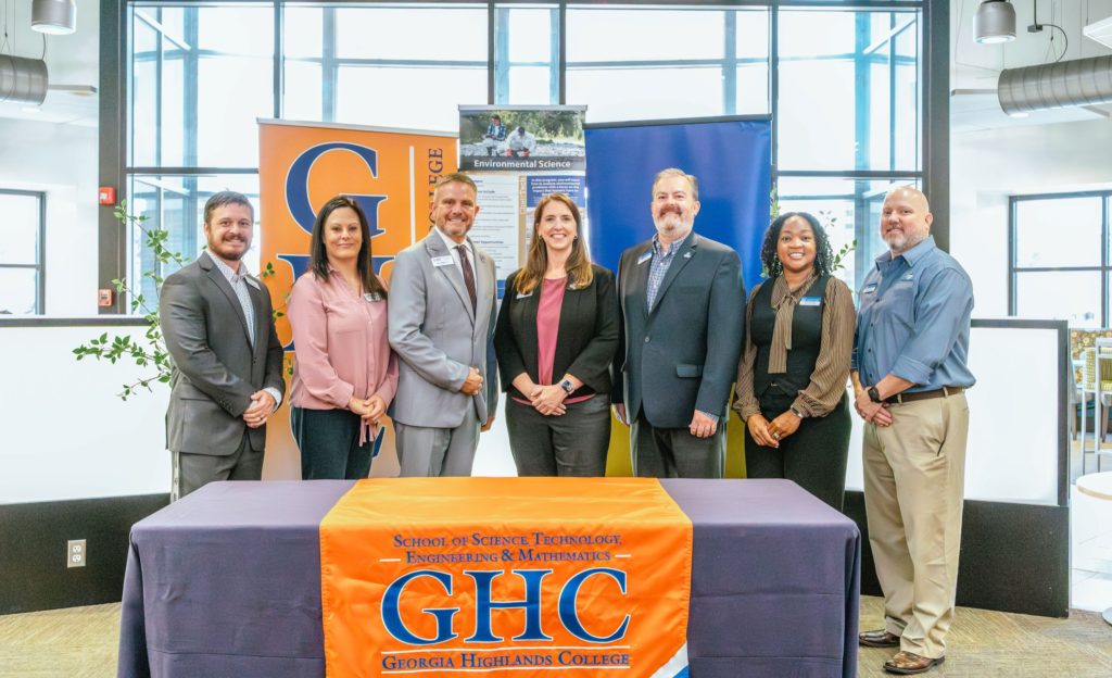 Chatt Tech and Georgia Highlands College leaders are shown standing at the signing ceremony table.