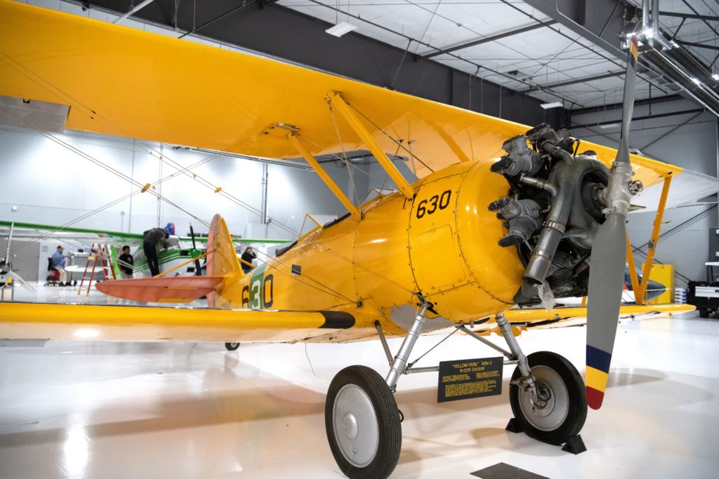 The N3N airplane is parked in the hangar at the Chatt Tech Aviation Training Academy.