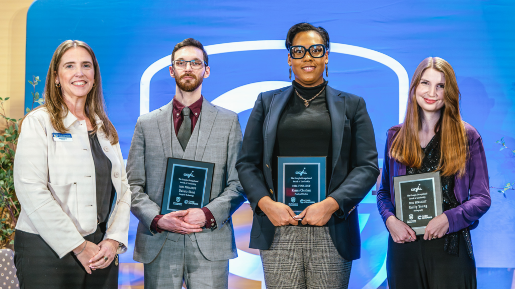 GOAL finalists Dakota Short, Khaana Cheatham, and Emily Young standing with President Heather Pence.